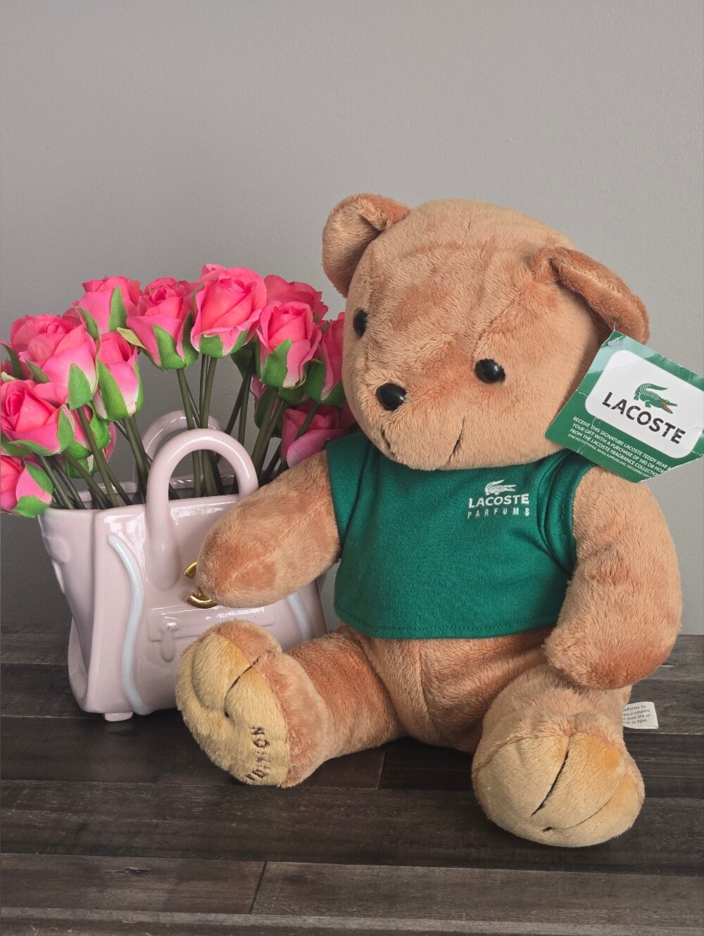 Lacoste Tan Teddy Bear with Green Tee and Pink Roses Accent